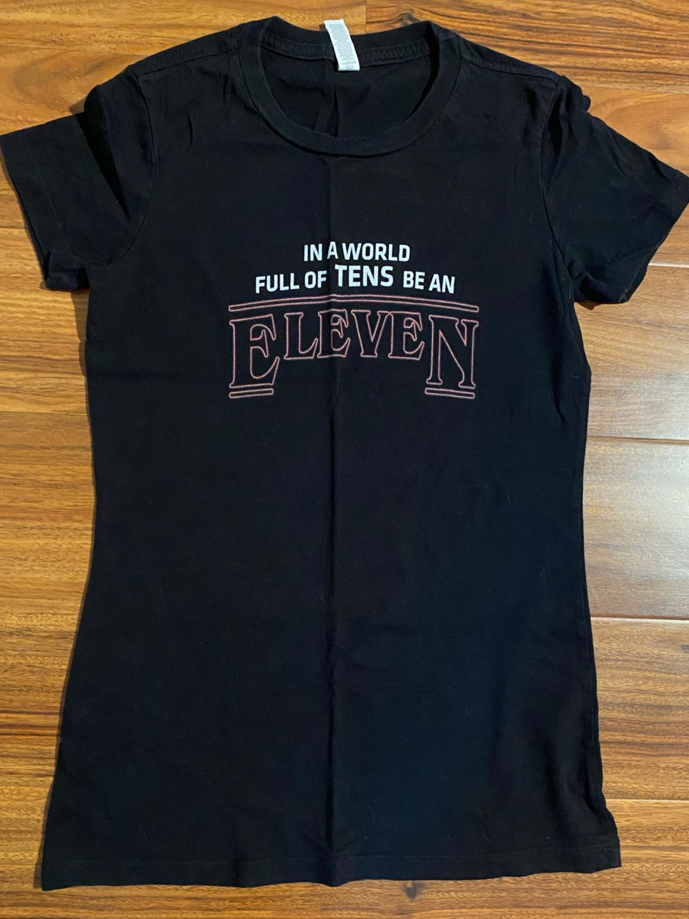 Black Stranger Things "In a World Full of Tens Be an Eleven" graphic t-shirt tee